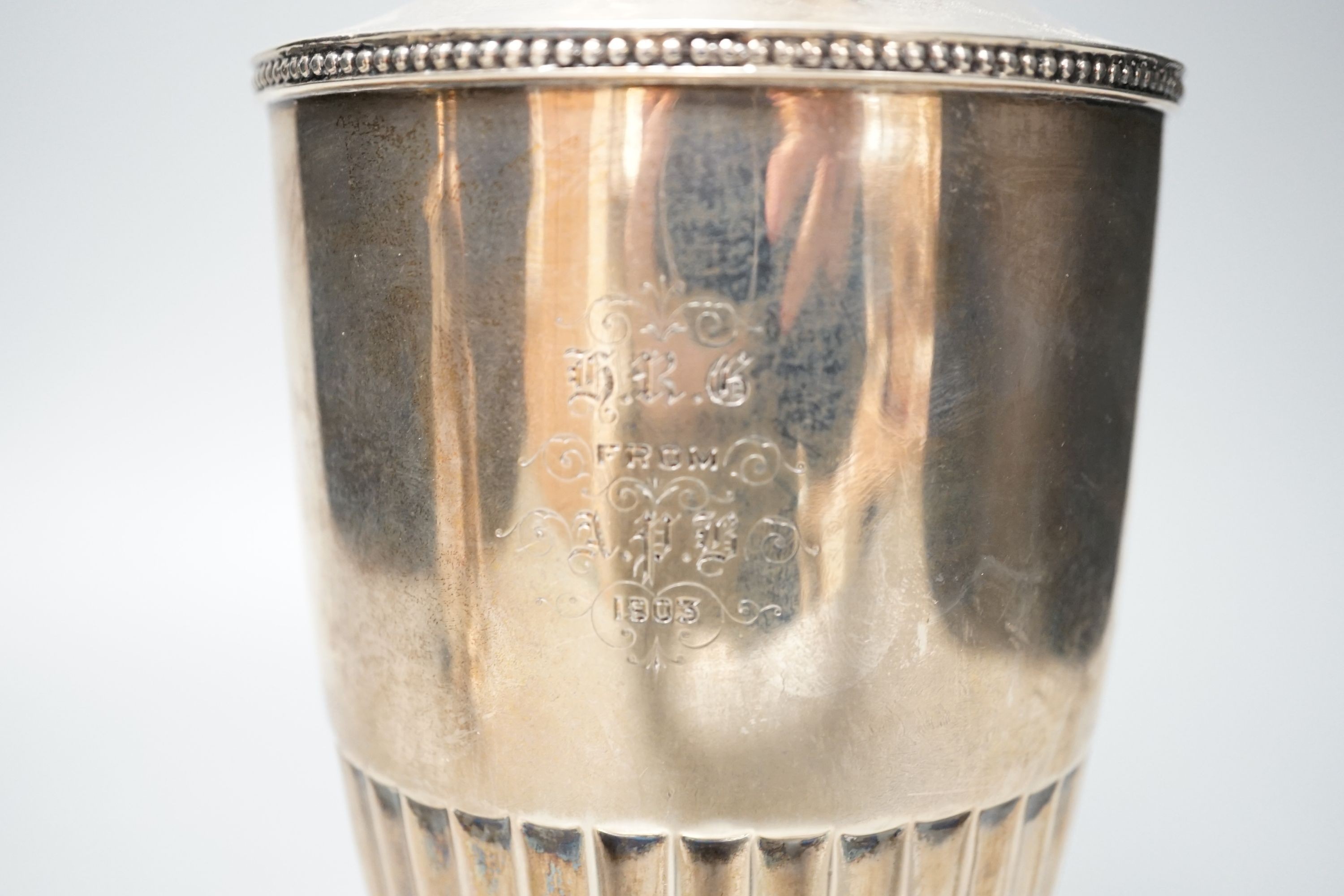 An Edwardian silver hot water jug, by William Hutton & Sons, London, 1901, height 30.7cm, gross weight 18.5oz.